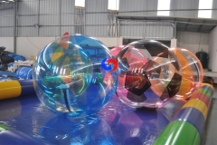 mixed color floating inflatable water rolling walking ball with colorful inflatable swimming pool for sale