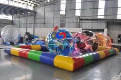 mixed color floating inflatable water rolling walking ball with colorful inflatable swimming pool for sale