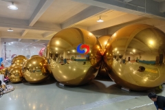 Lighting, Weddings, Corporate, Live Events beautiful decor giant mirror spheres chrome balloons adorning ceiling & architecture