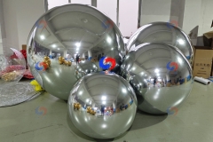 Supplying & Styling bespoke balloon displays corporate event birthday decor big shiny silver golden inflatable mirror balls