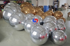 christmas holiday corporate event decor styling luxury giant Shimmering Gold big shiny balls Silver Balloon Orbs