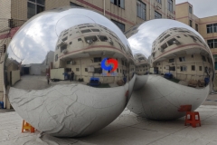 Corporate events backdrop giant balloons hanging big shiny silver inflatable sphere mirror balls as decoration